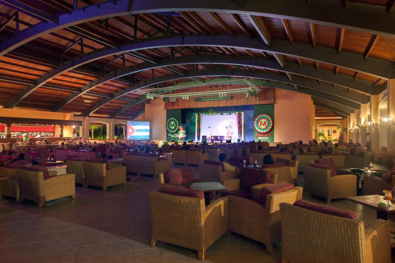 Majestic Elegance Punta Cana (Adults Only) Экстерьер фото The interior of the resort's main lobby